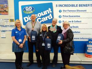 from left to right - Members of staff from Go Outdoors with Rotary President Jim Rawson, Soroptimist President Cynthia Horrocks and Trish Green, Manager of the Brick receiving the sleeping bags.
